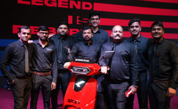 Kinetic employees with the new Kinetic DX EV electric scooter