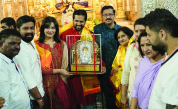 First Kinetic DX electric scooter receiving blessings at Shrimant Dagdusheth Ganpati Temple in Pune