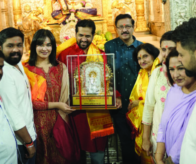 First Kinetic DX electric scooter receiving blessings at Shrimant Dagdusheth Ganpati Temple in Pune
