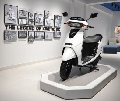 Kinetic DX electric scooter in showroom showcasing modern EV design in India