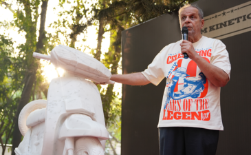 Dr Arun Firodia speaking at event promoting women empowerment with Kinetic scooter