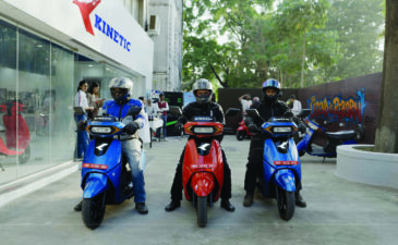 Journalists riding Kinetic DX+ electric scooters during Kinetic EV media ride event in Pune