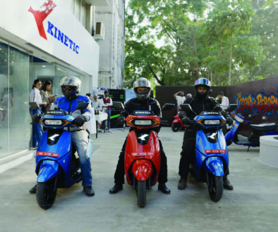 Journalists riding Kinetic DX+ electric scooters during Kinetic EV media ride event in Pune