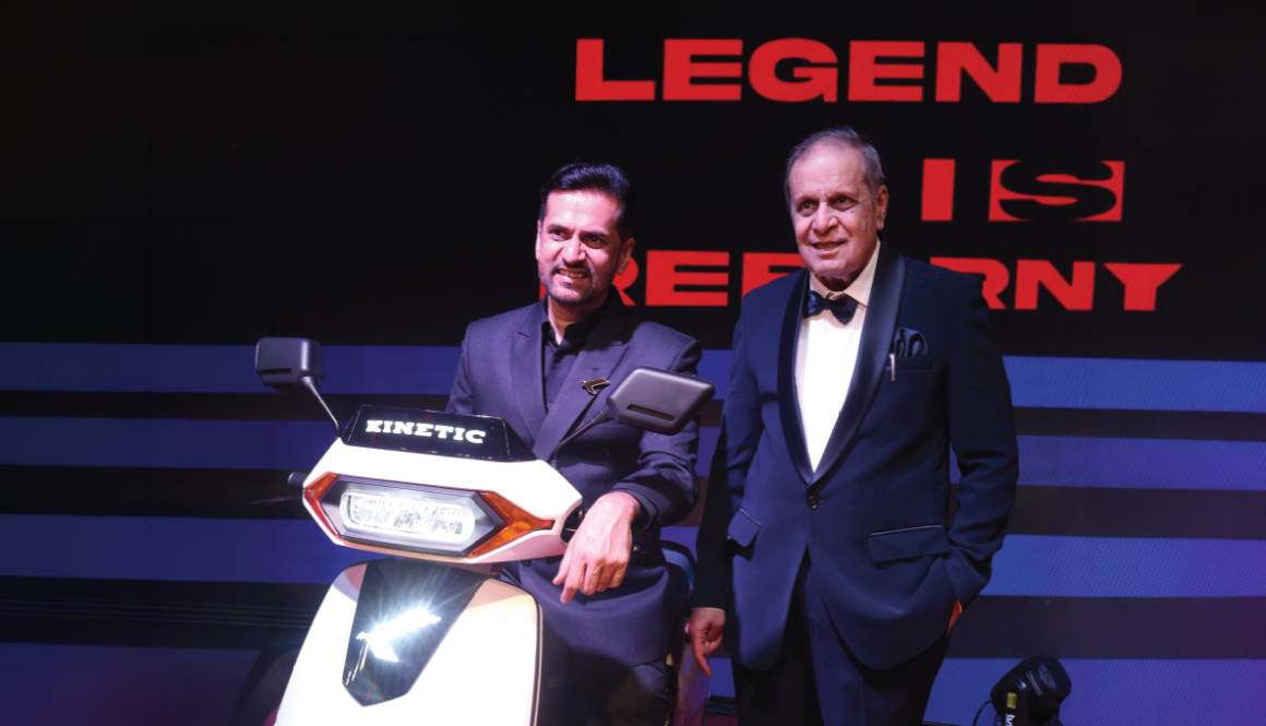Dr. Arun Firodia and Ajinkya Firodia with the Kinetic DX EV, celebrating the legacy of innovation and the future of electric mobility in India.