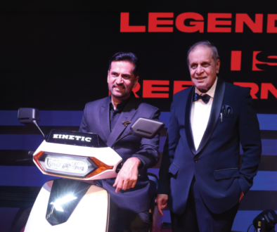 Dr. Arun Firodia and Ajinkya Firodia with the Kinetic DX EV, celebrating the legacy of innovation and the future of electric mobility in India.