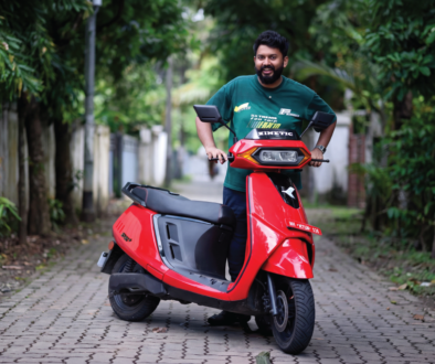 Journalist experiencing a Kinetic EV electric scooter during the exclusive media ride event in Kochi, showcasing smart, sustainable urban mobility.