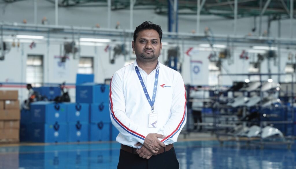Sumit Kumar at the Kinetic EV factory overseeing Kinetic DX quality control